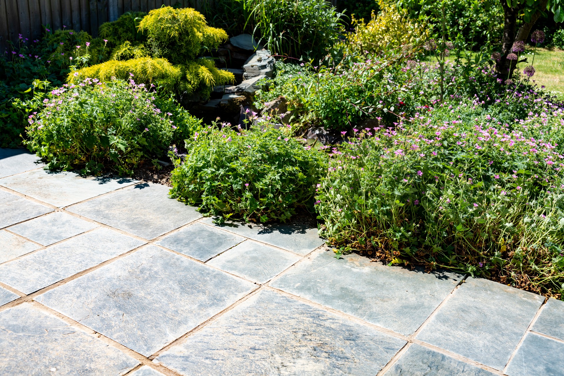 Welsh green slate garden patio freshly re-grouted with cement
